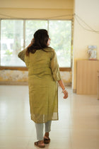Haritima olive green kurta — full length view styled for office daily wear