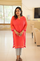 Anuradha gamcha check kurta — 3/4 sleeve with shoulder gather, styled for office wear