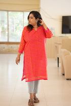 Anuradha orange and hot pink check handwoven cotton kurta — front view with covered button placket detail