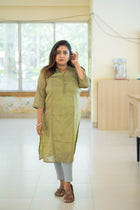 Haritima olive green handwoven kurta — back view showing straight midi silhouette