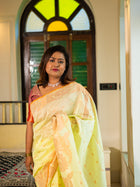 Pastel Lime Handloom Silk Saree with Golden Floral Weave