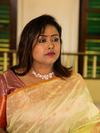 Pastel Lime Handloom Silk Saree with Golden Floral Weave