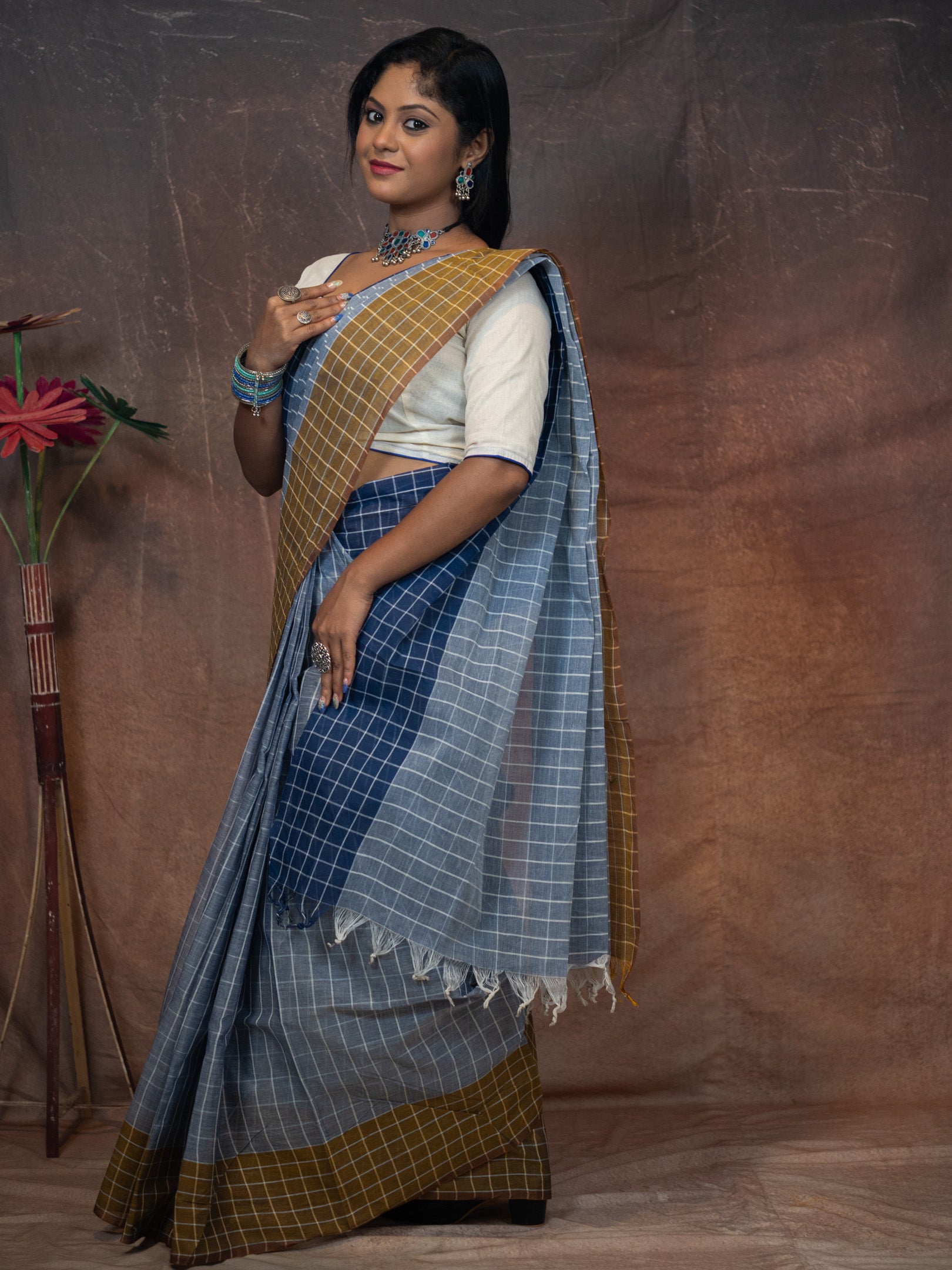 Soothing grey-blue base  Saree