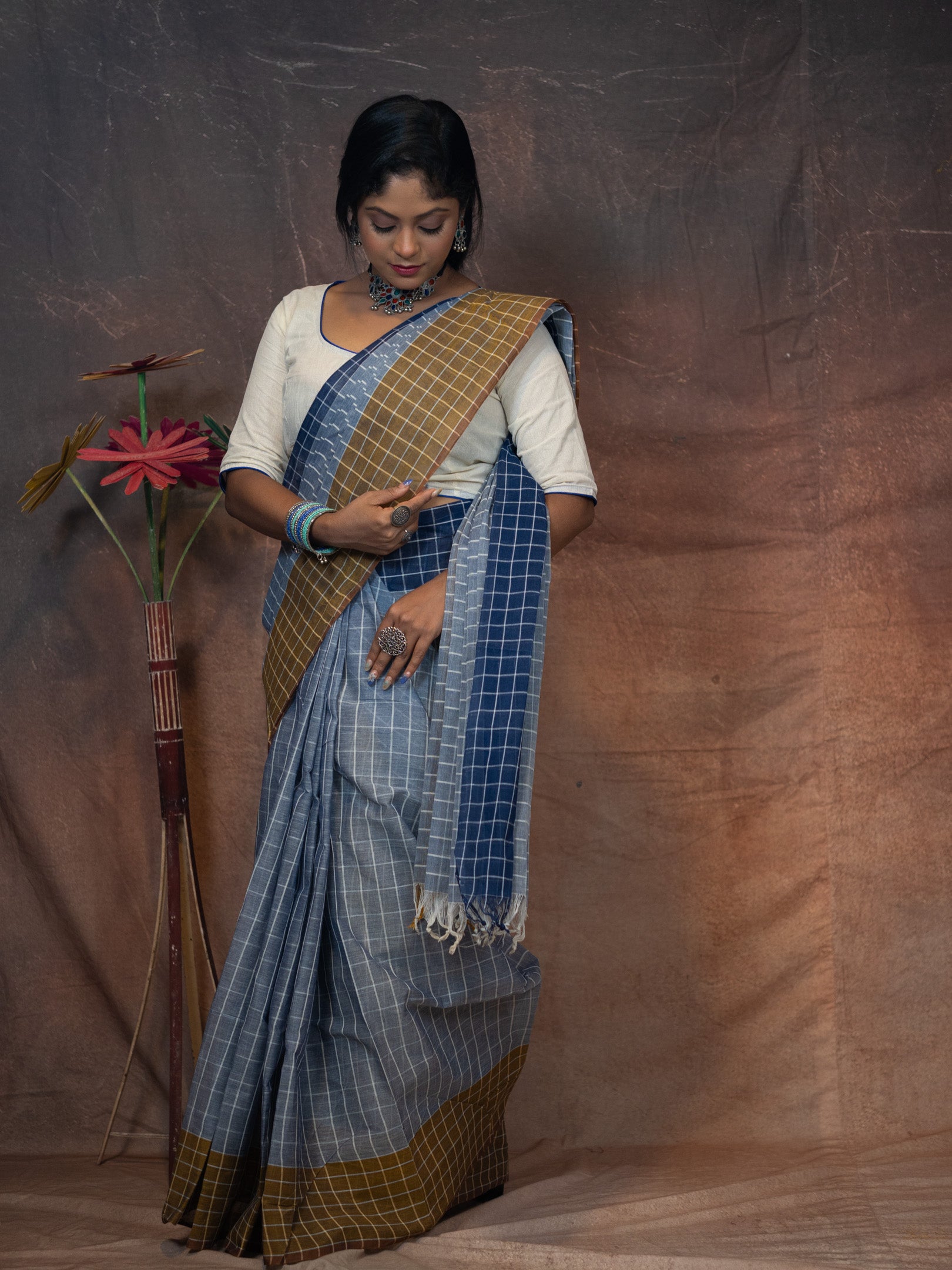 Soothing grey-blue base  Saree