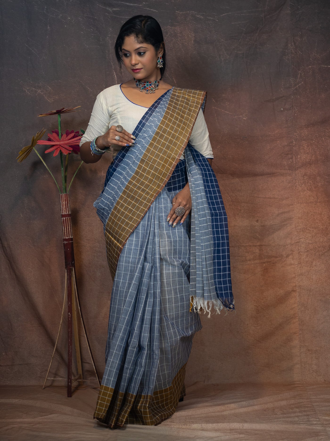 Soothing grey-blue base  Saree