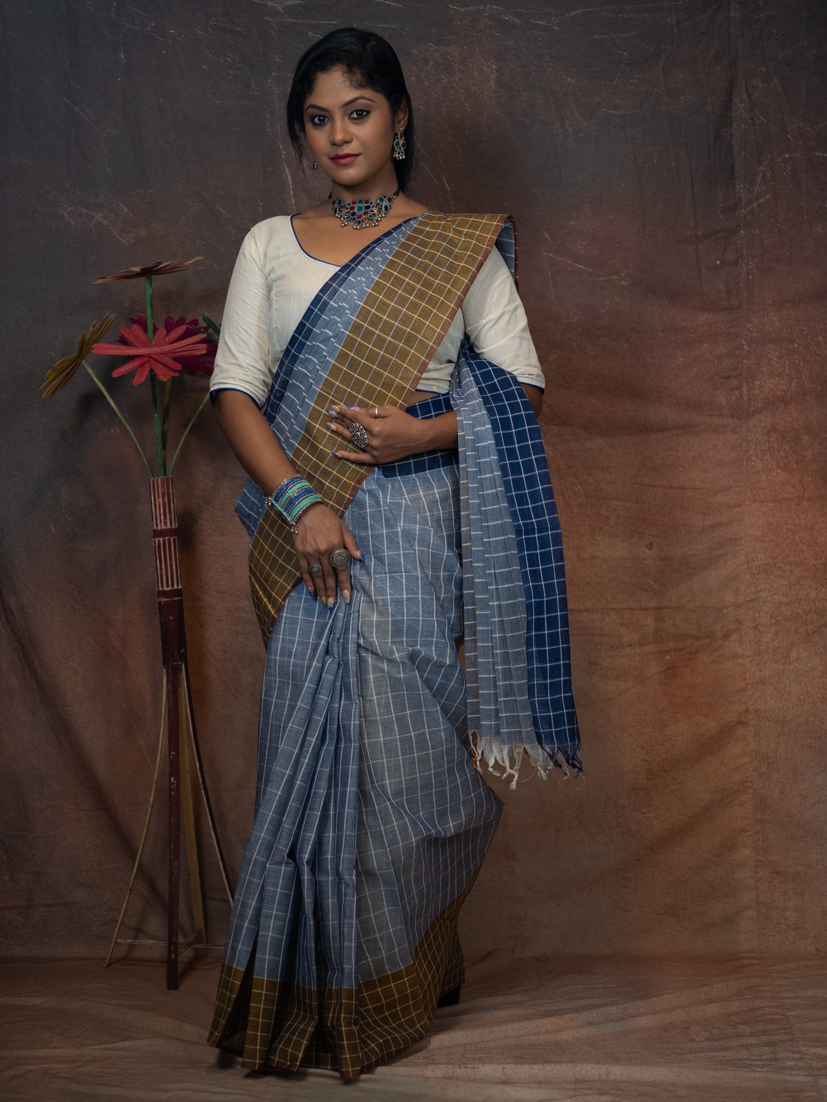 Soothing grey-blue base  Saree