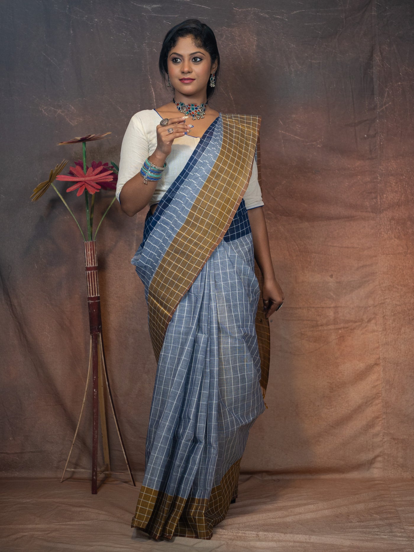 Soothing grey-blue base  Saree